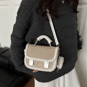 Winter lamb wool square shoulder bag with khaki suede and plush trim worn by a model