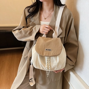 Fashionable beige and khaki nylon backpack with YOU JI BEAR logo and drawstring closure