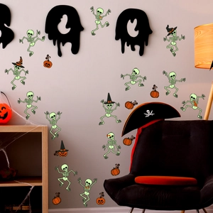 Luminous Halloween wall stickers featuring dancing skeletons, pumpkins, and Boo lettering decor