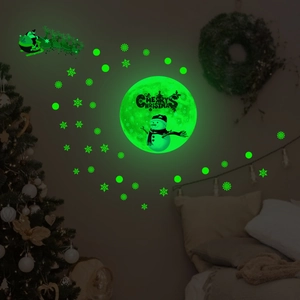 Luminous Christmas wall stickers with glowing moon, snowman and Santa's reindeer sleigh