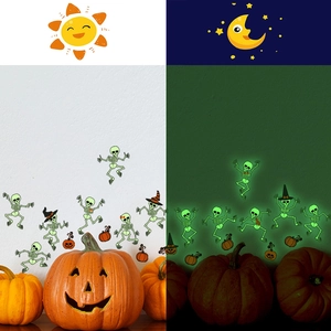 Luminous Halloween wall stickers showing glow-in-the-dark skeletons and pumpkins day and night