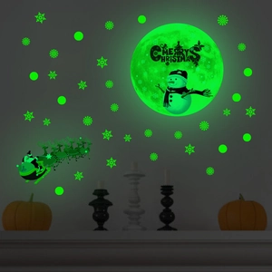 Luminous Christmas wall stickers with glowing moon, snowman and Santa Claus decals