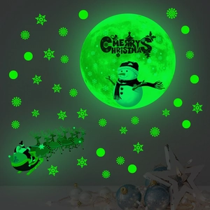 Glow-in-the-dark Christmas wall stickers featuring luminous snowman moon and reindeer sled