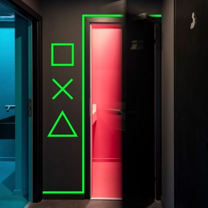 Luminous gaming room wall stickers featuring fluorescent green geometric icons on floor