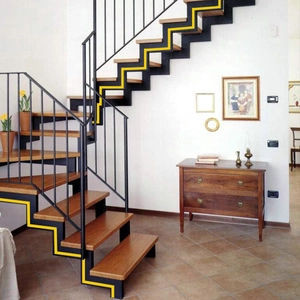Digital yellow outline showing the serrated edge of a modern indoor stair frame