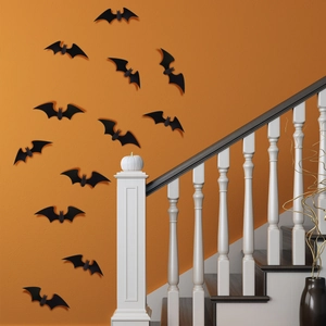 3D-Fledermaus-Wandaufkleber für Halloween-Deko auf einem orangefarbenen Hintergrund