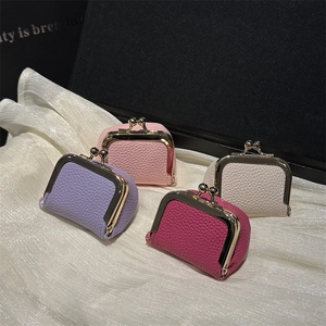 Mini leather jewelry pouches in four colors with gold metal clasps for rings and lipsticks