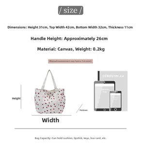 Detailed size chart for the strawberry print canvas tote bag with A4 scale comparison