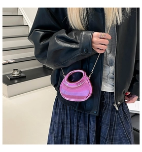 Chic pink metallic crossbody bag with pleated texture and stylish chain strap detail