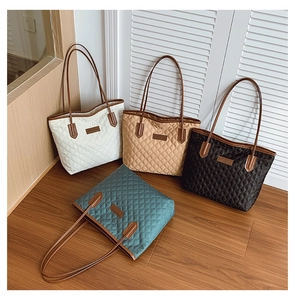 Detailed collection of quilted tote bags in white, khaki, black, and blue-green colors