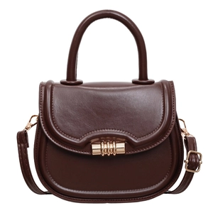 Classic dark brown leather saddle bag with gold buckle and top handle for women