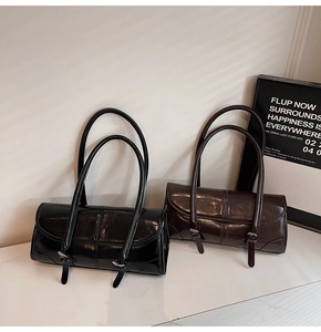 Close-up of black and dark coffee large capacity retro oil leather shoulder bags