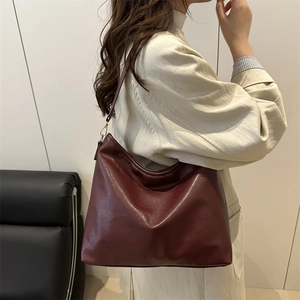 Deep wine red large capacity tote bag with long shoulder strap and golden metal buckle