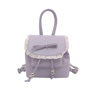 Mini lavender ballet-style bucket backpack with white lace trim and bow accent
