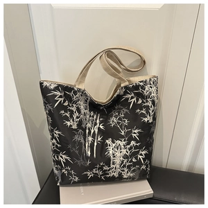Detail of Chinese style waterproof tote bag featuring artistic white bamboo ink patterns