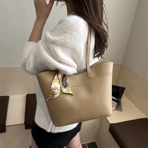 Minimalist beige leather tote bag for women with floral silk scarf detail for office commuting