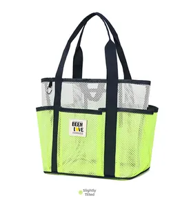 Detail view of the durable mesh structure and reinforced straps on this beach tote bag
