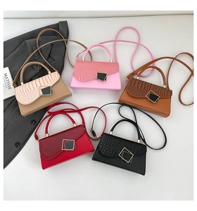 Collection of crocodile pattern flap handbags in beige, pink, brown, red, and black