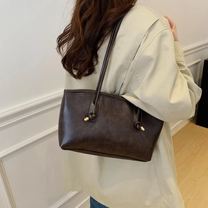 Large dark brown vintage tote bag in textured PU leather with knotted shoulder straps