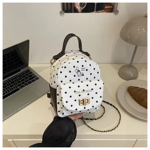 Mini sac à dos à pois avec imprimé chat et fermoir rotatif doré en détail