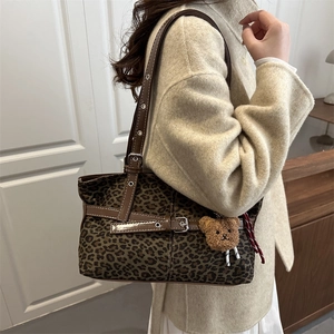 Retro leopard print suede tote bag with brown leather straps and plush bear charm