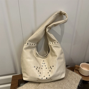 Retro cream hobo shoulder bag with silver rivet star pattern for casual chic autumn style