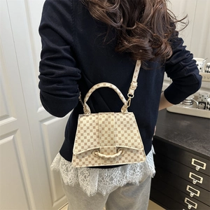 Chic cream crossbody bag with vintage brown floral pattern and golden metal buckle