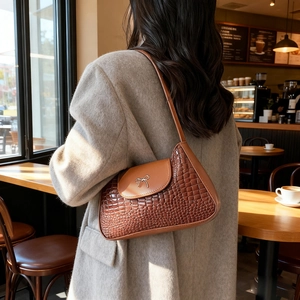 Retro brown crocodile pattern shoulder bag with a silver bow clasp for women
