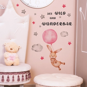 Nursery wall decal featuring a watercolor rabbit with stars and German text decor