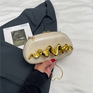 Beige leather box clutch bag with gold wavy metal handle and thin chain strap for women