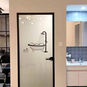 Detail of waterproof vinyl bathroom wall sticker with shower and bathtub motif on glass door