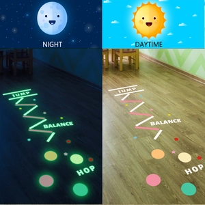 Luminous game floor stickers showing daytime and glowing night view comparison