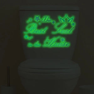 Luminous toilet decal with 'The Best Seat in the House' slogan and crown design