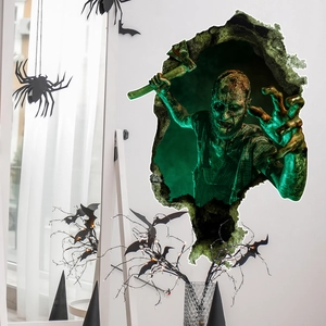 Close-up of 3D zombie wall sticker with axe breaking through wall for Halloween