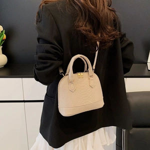Retro cream faux crocodile shell handbag for women with dual handles and crossbody strap