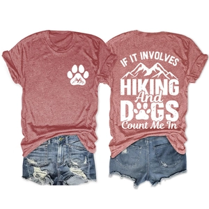Detailed front and back view of a hiking and dog themed t-shirt with distressed denim shorts