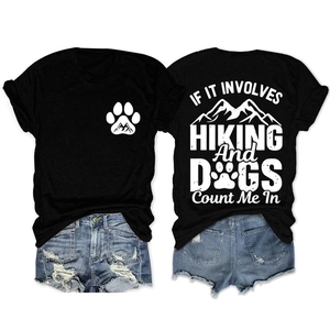 Detail of hiking and dog print on back of a black cotton crew neck short sleeve tee
