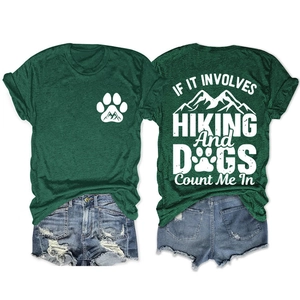 Front and back view of dark green hiking t-shirt with dog paw and mountain prints
