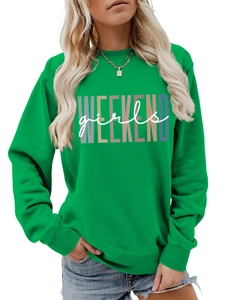 Close-up of green crewneck sweatshirt with Weekend Girls text and ribbed neckline detail