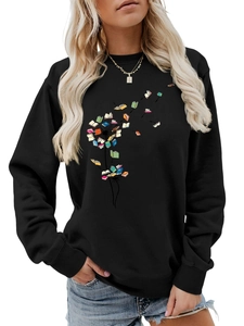 Detail of creative colorful dandelion book print on casual black long-sleeve sweatshirt