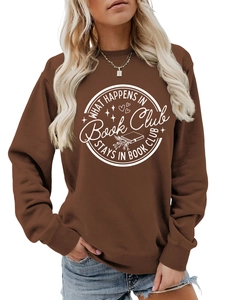 Close-up of What Happens in Book Club text print on casual brown cotton sweatshirt