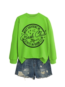 Detail of neon green sweatshirt with Book Club slogan and ribbed cuffs close-up