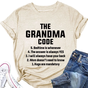 Flat lay of beige cotton t-shirt with The Grandma Code slogan print and denim jeans