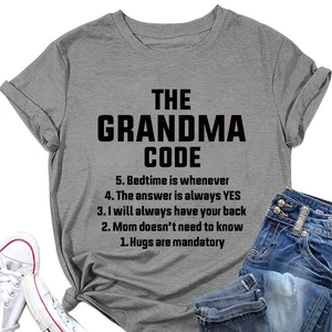 Flat lay of gray cotton t-shirt with The Grandma Code slogan and blue jeans