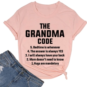 Detail of light pink T-shirt featuring THE GRANDMA CODE print and side-tied hem design