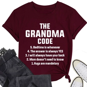 Close-up of wine red crew neck t-shirt featuring white The Grandma Code artistic print