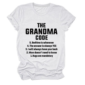 Detail of white cotton T-shirt featuring black The Grandma Code text and ribbed neckline
