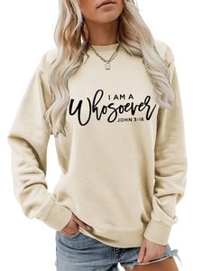 Close-up of I AM A Whosoever JOHN 3:16 printed text on women's beige sweatshirt