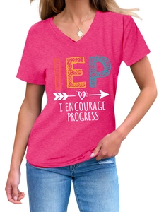 Detail of pink V-neck T-shirt featuring artistic IEP logo and I ENCOURAGE PROGRESS print