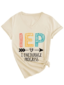 Detail of cream V-neck tee featuring IEP print and stylish front knot hem design